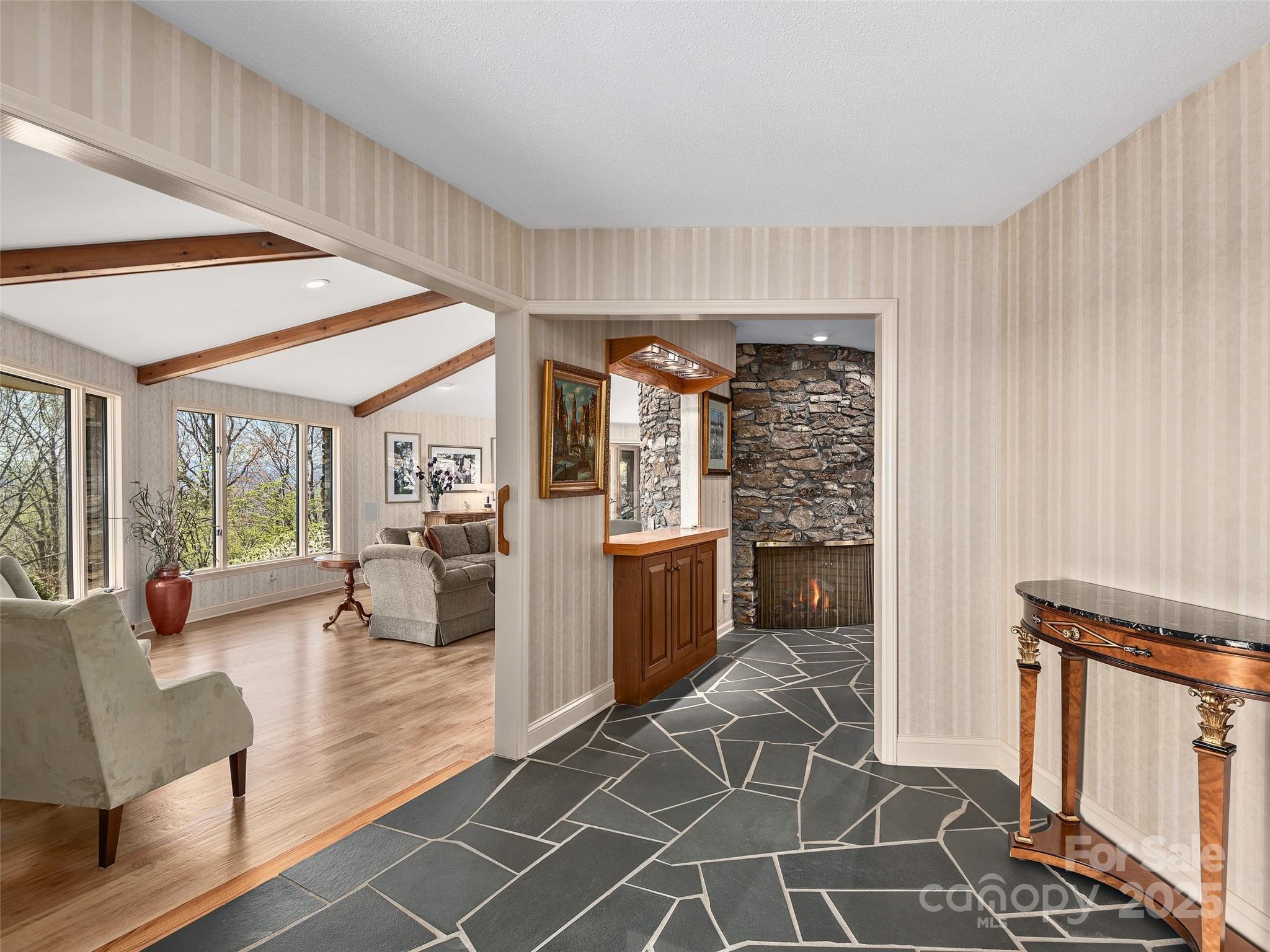 1300 Randy Drive Hendersonville, NC 28791 - Photo 5 of 48 a living room with furniture a window and wooden floor