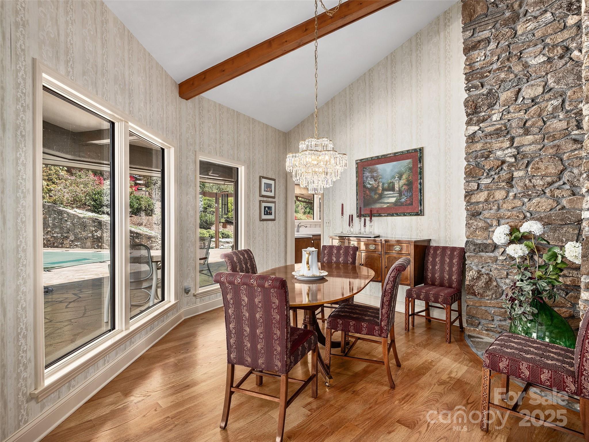 1300 Randy Drive Hendersonville, NC 28791 - Photo 10 of 48 a view of a dining room with furniture window and wooden floor