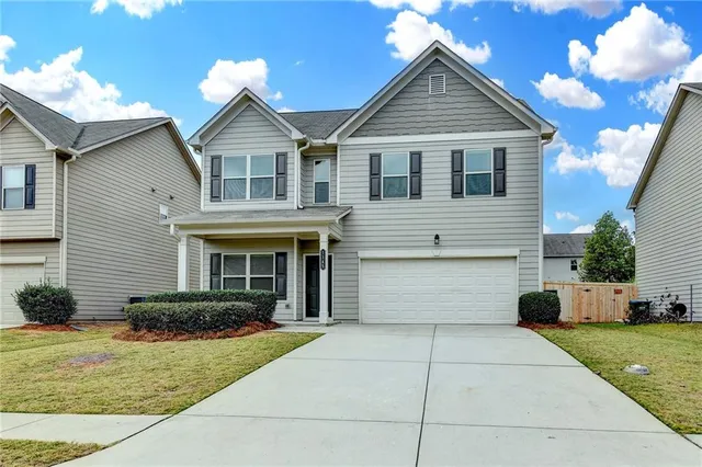 a house view with a garden space