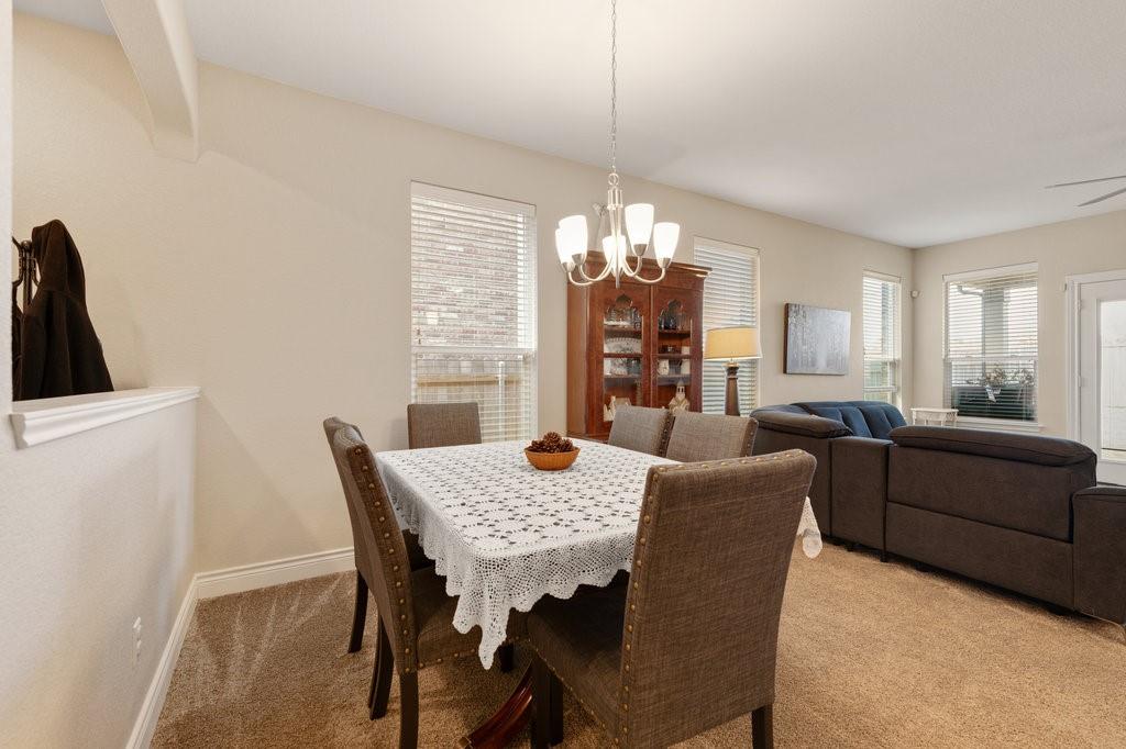2471 Sunrise Road, Unit 16 Round Rock, TX 78664 - Photo 11 of 28 a view of a dining room with furniture