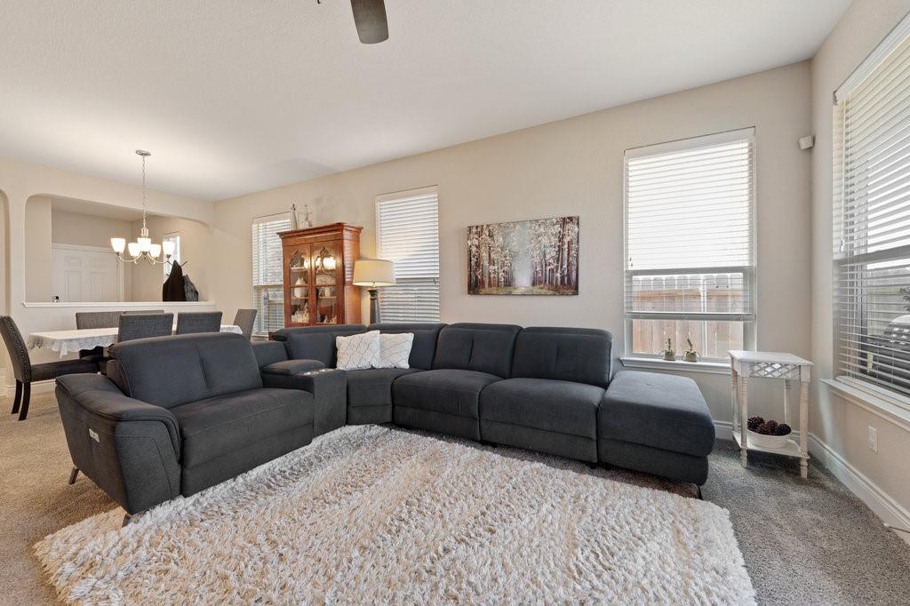 2471 Sunrise Road, Unit 16 Round Rock, TX 78664 - Photo 14 of 28 a living room with furniture and a large window