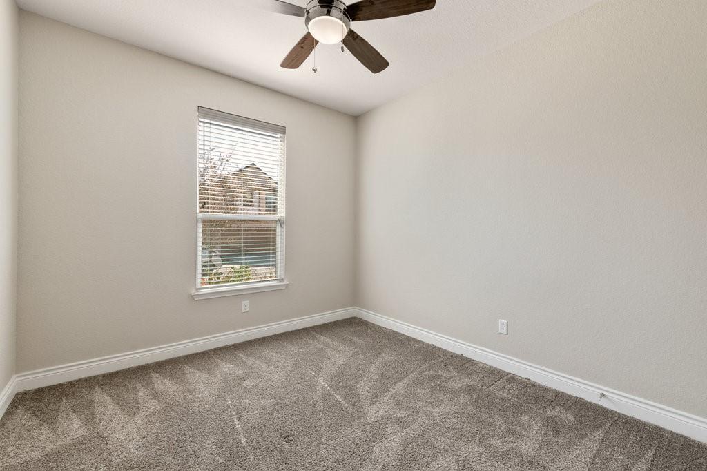 2471 Sunrise Road, Unit 16 Round Rock, TX 78664 - Photo 21 of 28 an empty room with a window