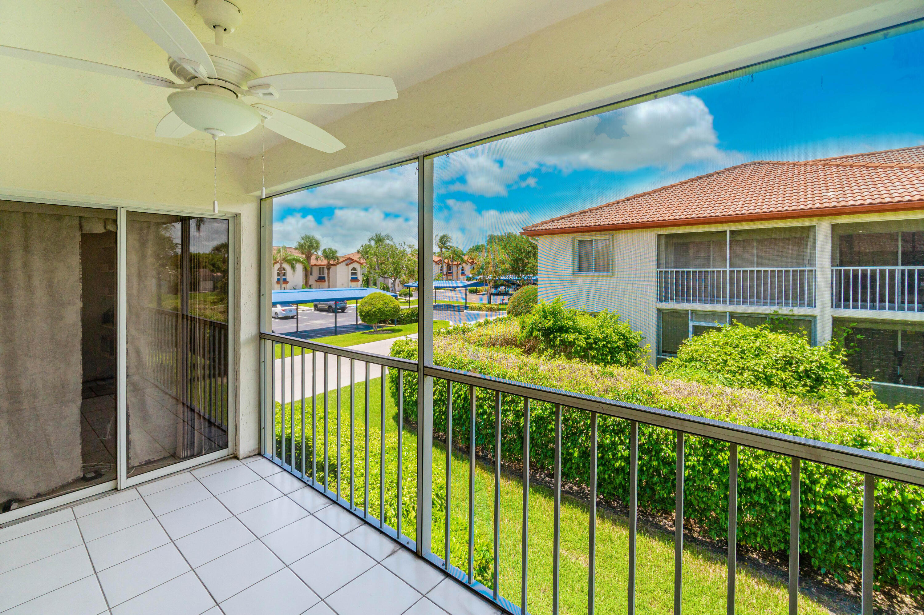 340 Northwest 67th Street, Unit 201 Boca Raton, FL 33487 - Photo 33 of 46 Screened balcony