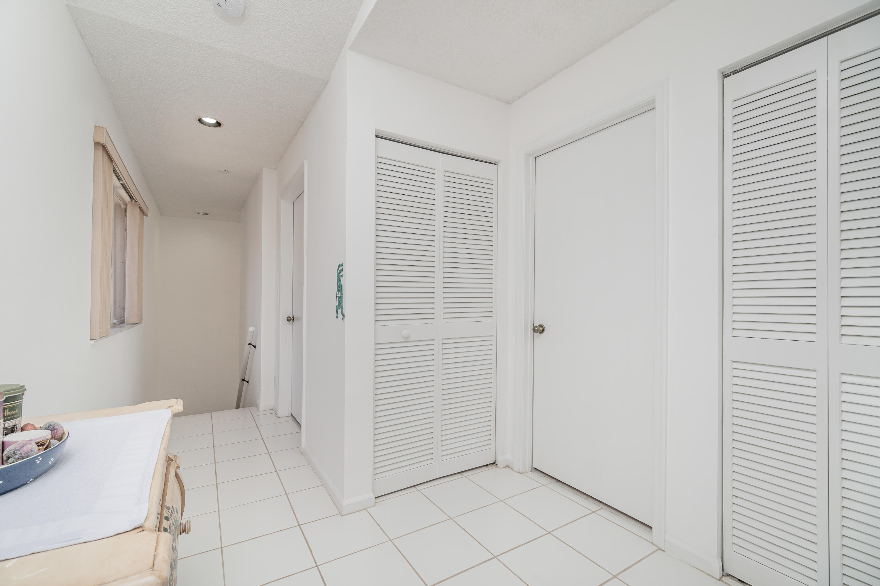 340 Northwest 67th Street, Unit 201 Boca Raton, FL 33487 - Photo 6 of 46 Second floor landing