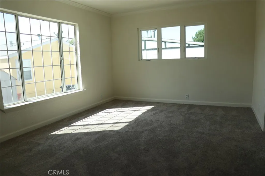 1855 East Riverside Drive, Unit 48 Ontario, CA 91761 - Photo 11 of 20 a view of empty room with window
