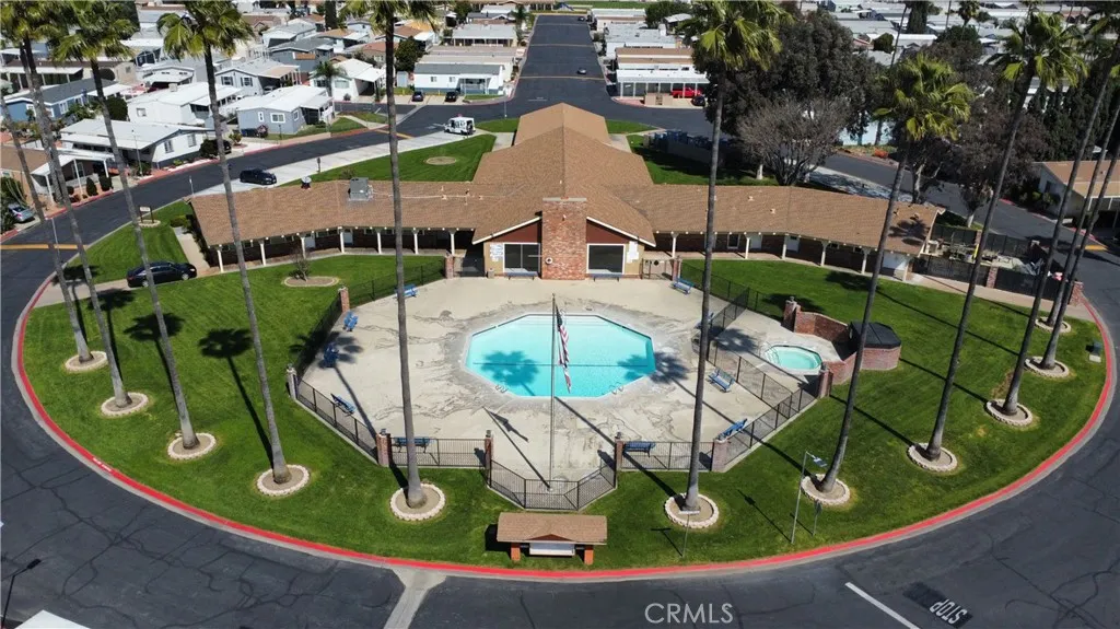 1855 East Riverside Drive, Unit 48 Ontario, CA 91761 - Photo 16 of 20 an aerial view of a house with outdoor space