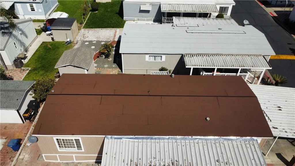 1855 East Riverside Drive, Unit 48 Ontario, CA 91761 - Photo 20 of 20 a view of roof deck with wooden floor and seating space