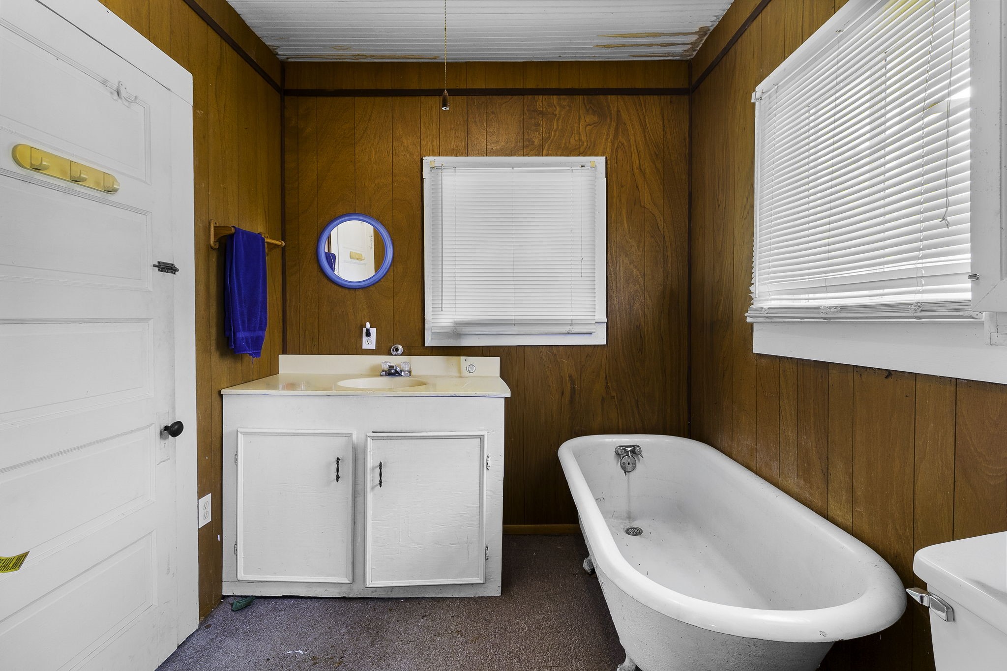 2 Triple Creek Loop Livingston, TX 77351 - Photo 16 of 49 a bathroom with a toilet a sink and a mirror