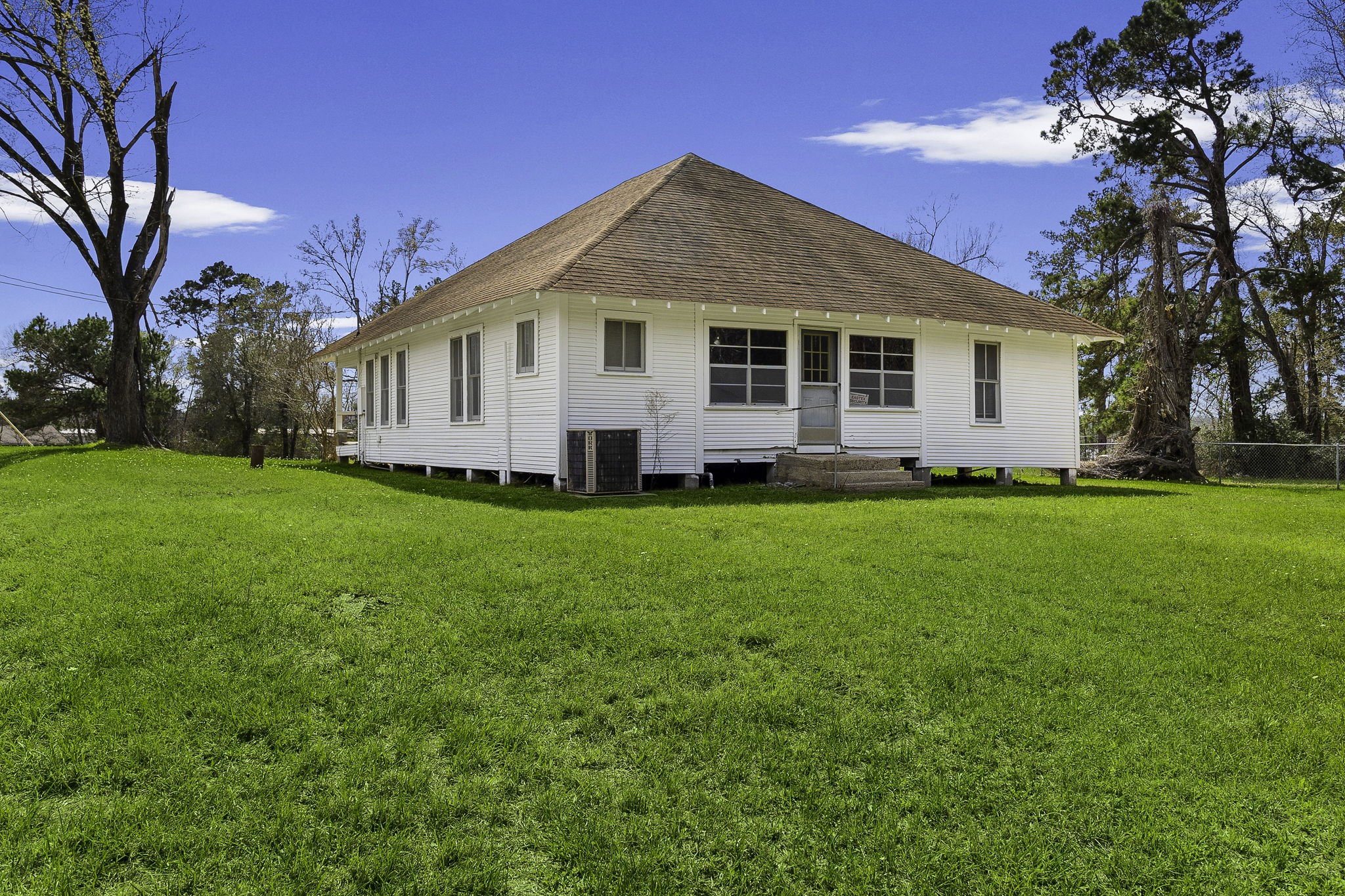 2 Triple Creek Loop Livingston, TX 77351 - Photo 20 of 49 a front view of a house with a yard