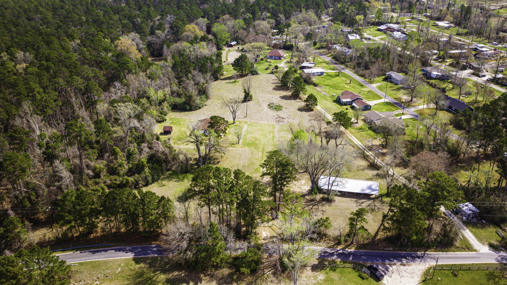2 Triple Creek Loop Livingston, TX 77351 - Photo 38 of 49 an aerial view of residential houses with outdoor space