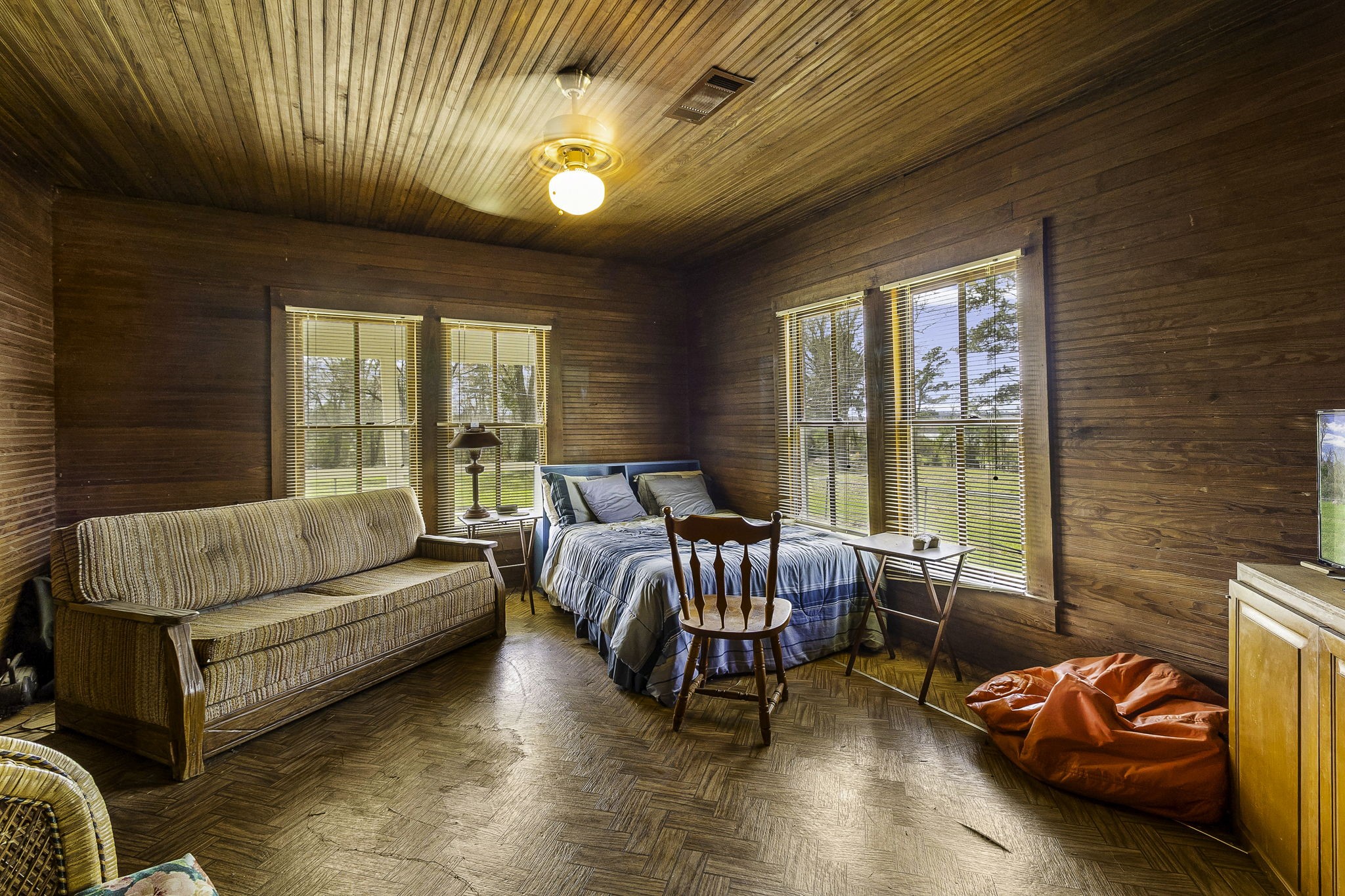 2 Triple Creek Loop Livingston, TX 77351 - Photo 9 of 49 a living room with furniture and floor to ceiling window