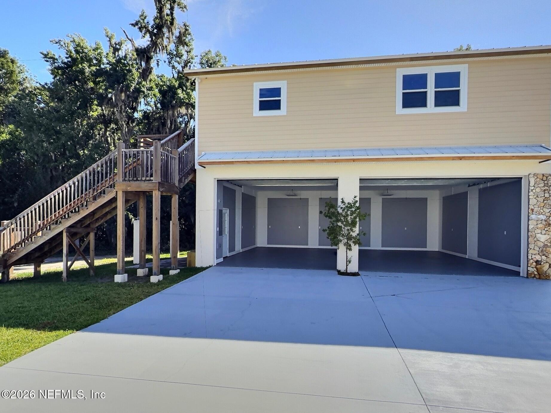 159 Mays Cove Road East Palatka, FL 32131 - Photo 38 of 62 a view of house and yard with green space