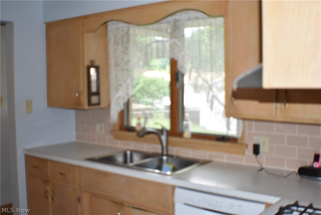 2155 Springfield Center Road Akron, OH 44312 - Photo 12 of 35 Tilted backsplash, newer dishwasher, oddles of cabinets