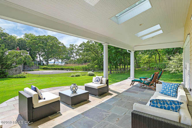 4 Highgate Road Riverside, CT 06878 - Photo 1 of 33 a living room with patio furniture and garden