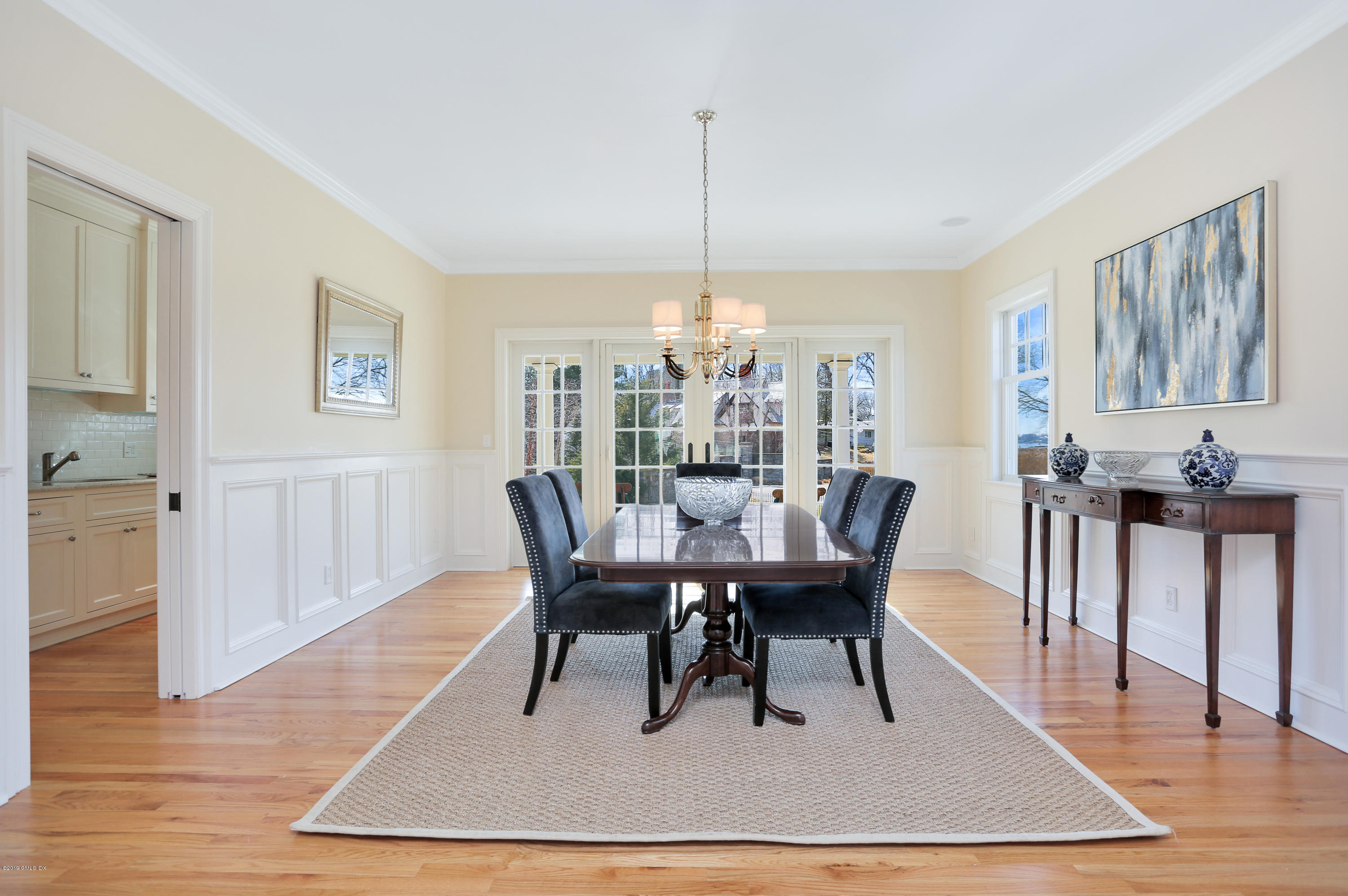 4 Highgate Road Riverside, CT 06878 - Photo 11 of 33 a view of a dining room with furniture window and wooden floor