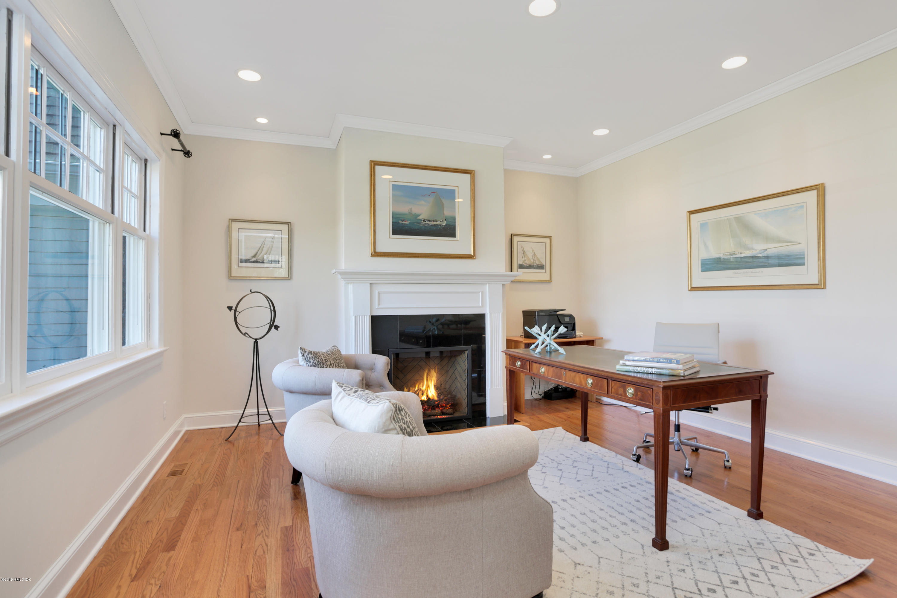 4 Highgate Road Riverside, CT 06878 - Photo 14 of 33 a living room with furniture and a fireplace