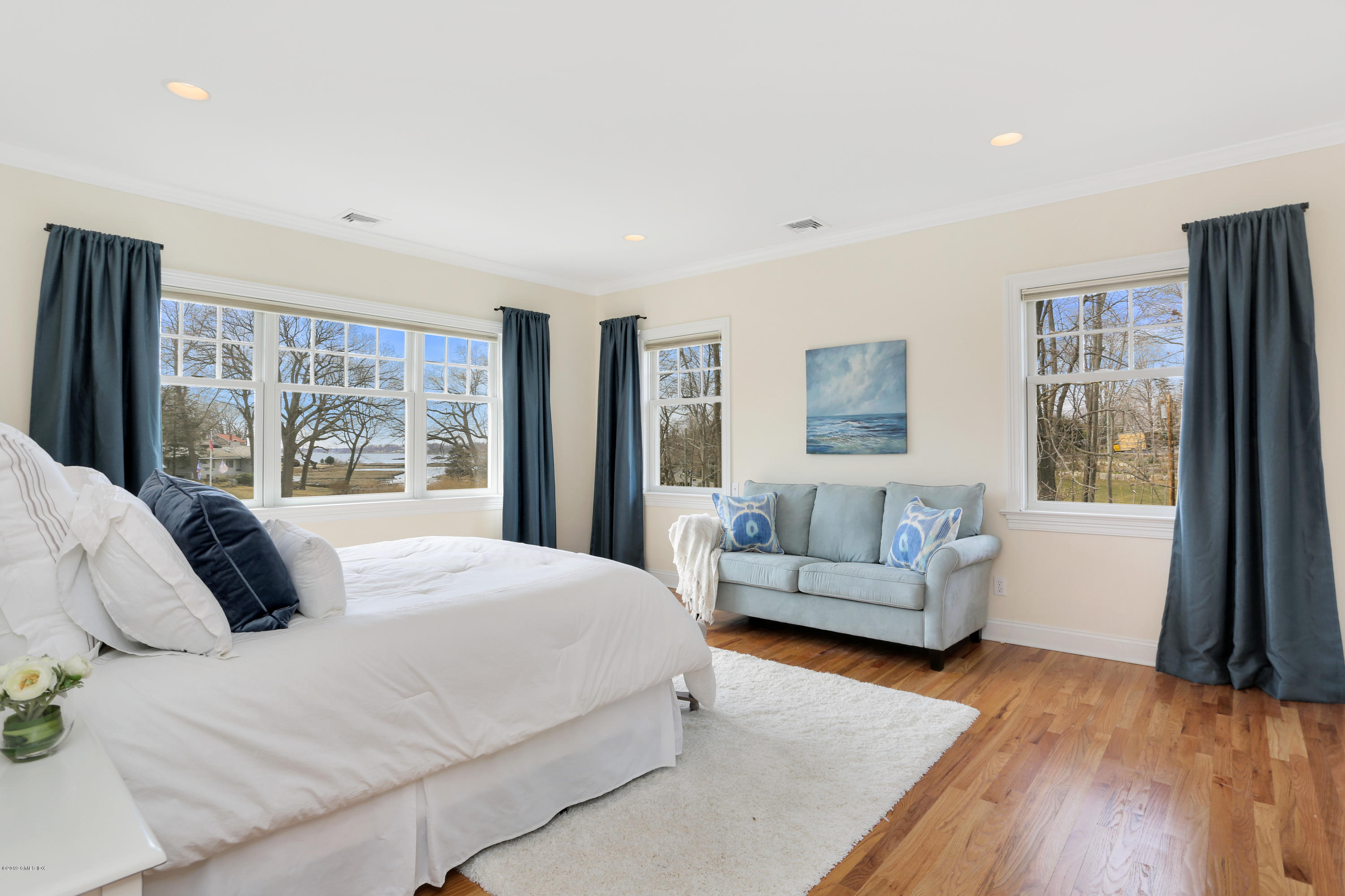 4 Highgate Road Riverside, CT 06878 - Photo 16 of 33 a bedroom with a bed and a couch