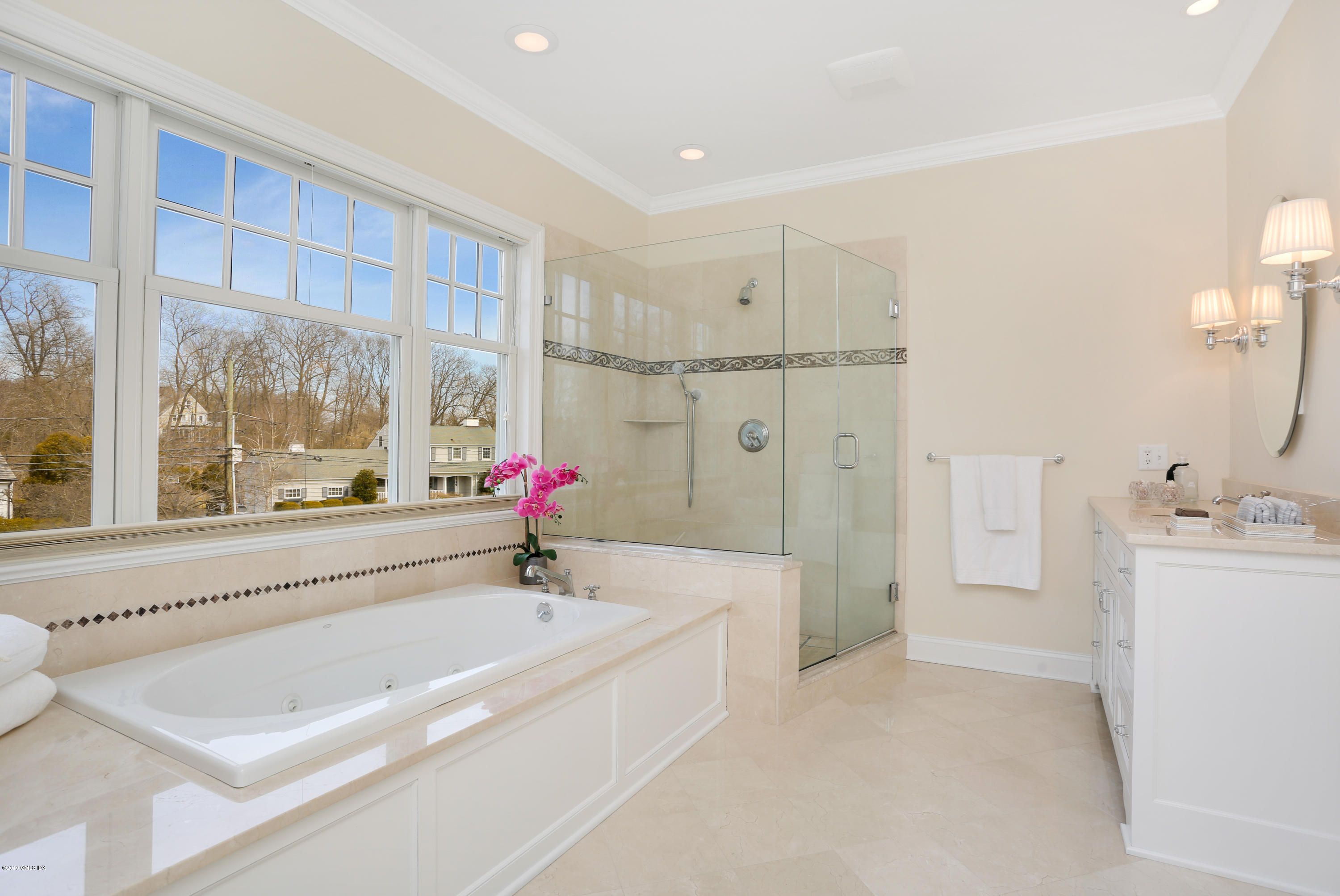 4 Highgate Road Riverside, CT 06878 - Photo 17 of 33 a spacious bathroom with a tub sink and mirror