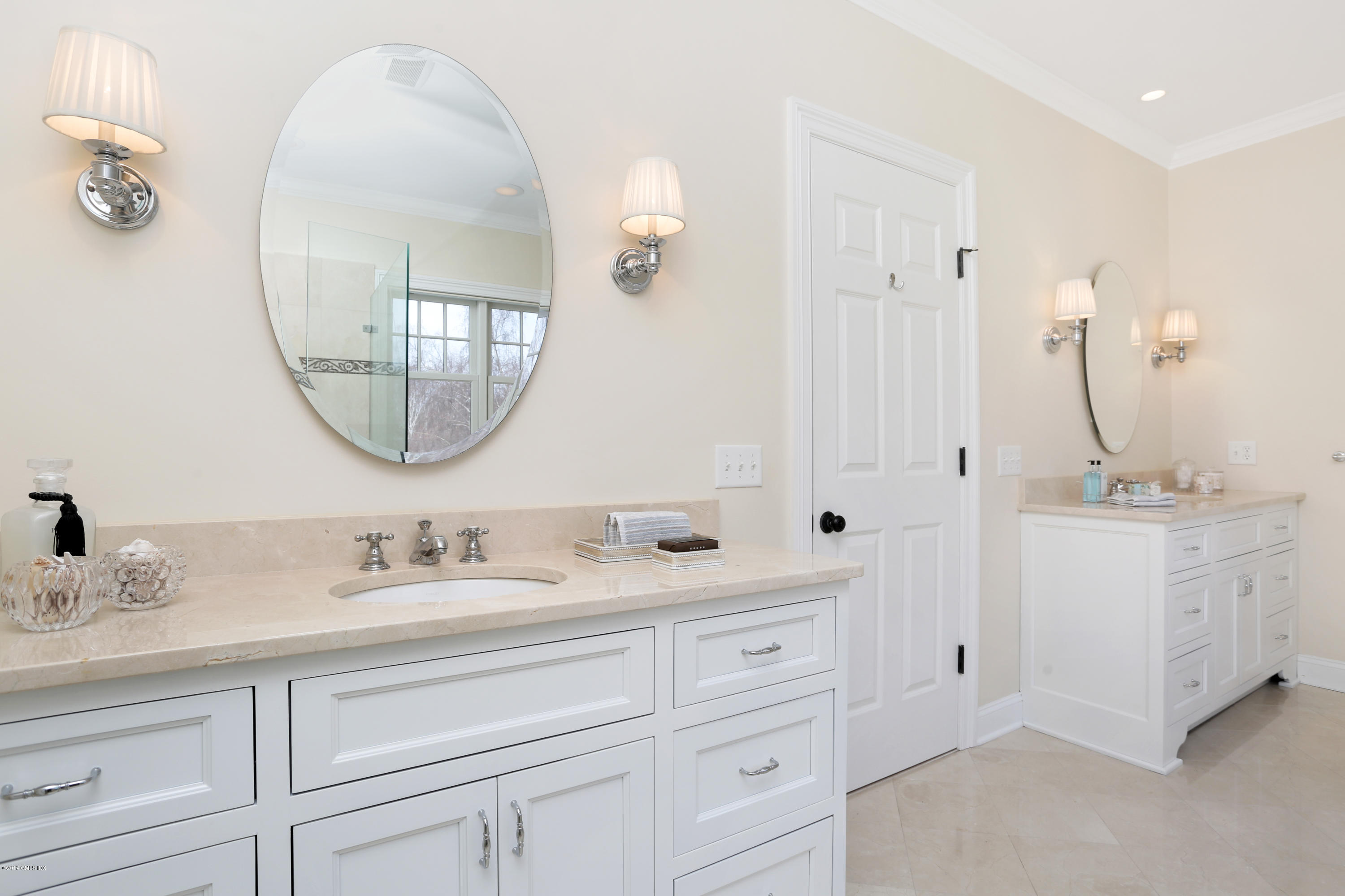 4 Highgate Road Riverside, CT 06878 - Photo 18 of 33 a bathroom with a double vanity sink and a mirror
