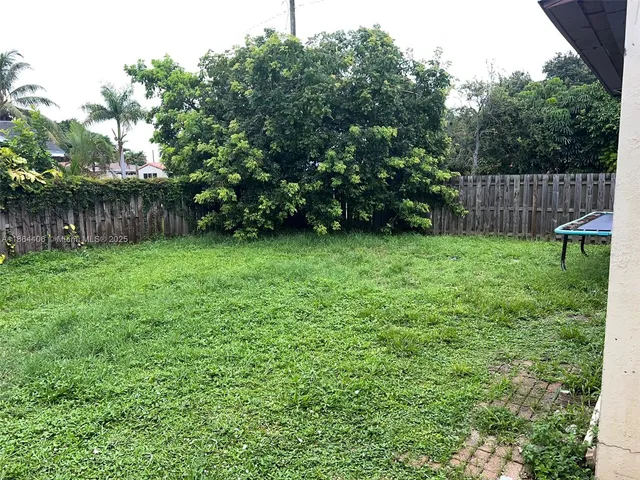 a view of an outdoor space and a yard