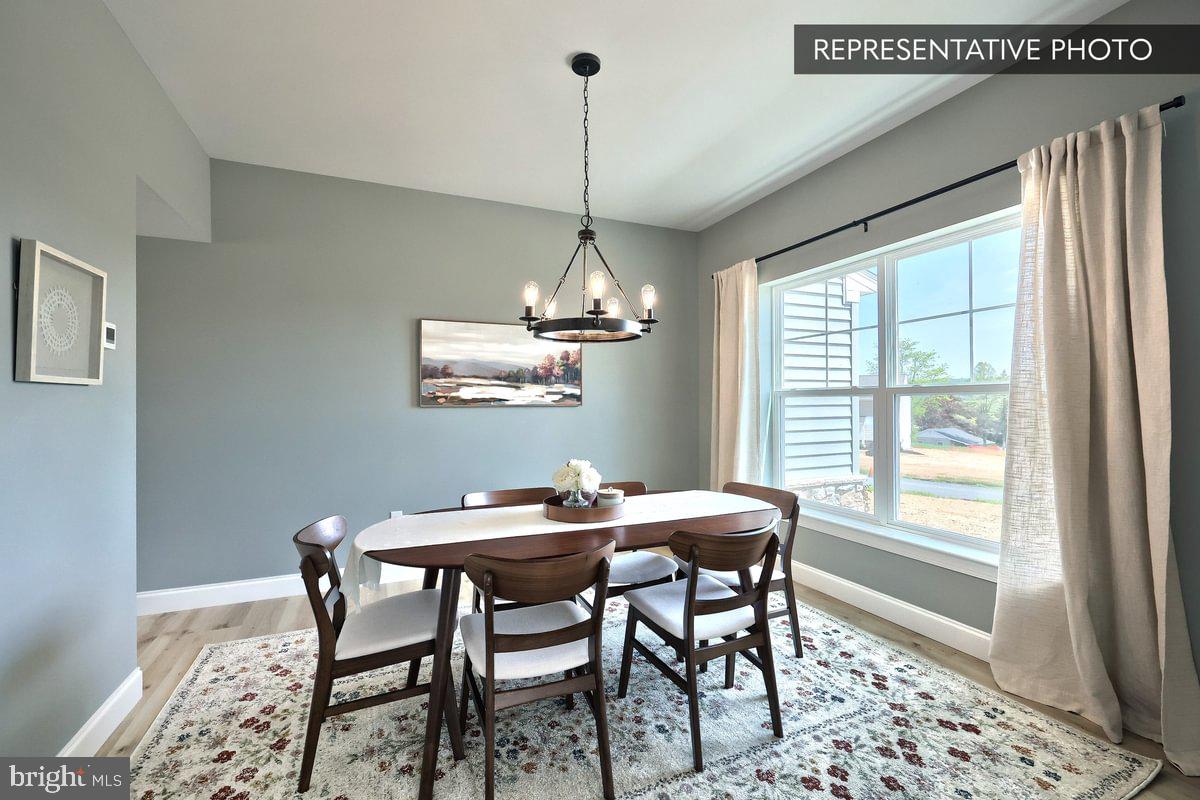 57 Sajer Road Pottsville, PA 17901 - Photo 16 of 22 a dining room with a table and chairs
