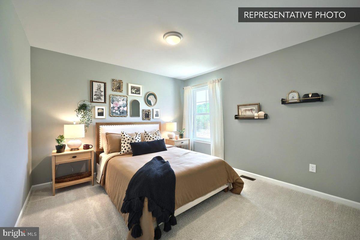 57 Sajer Road Pottsville, PA 17901 - Photo 20 of 22 a bedroom with a bed and a couch