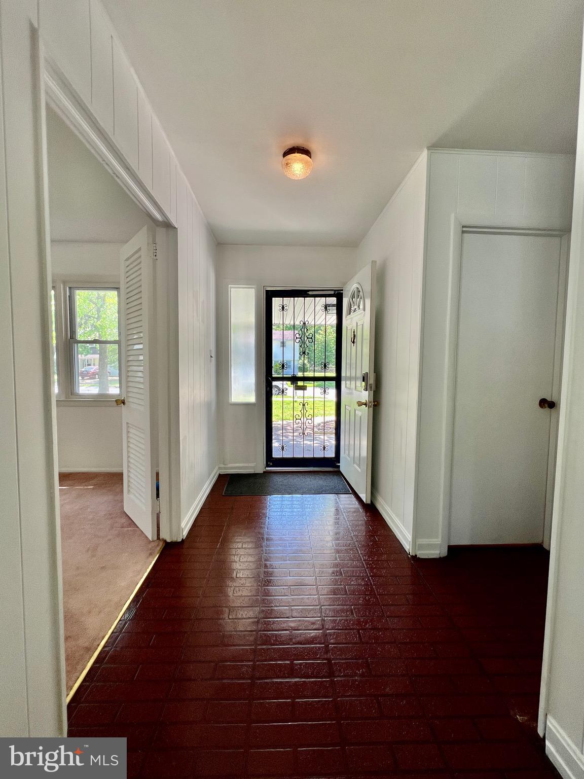 158 Brookside Boulevard Newark, DE 19713 - Photo 2 of 27 an empty room with wooden floor and windows