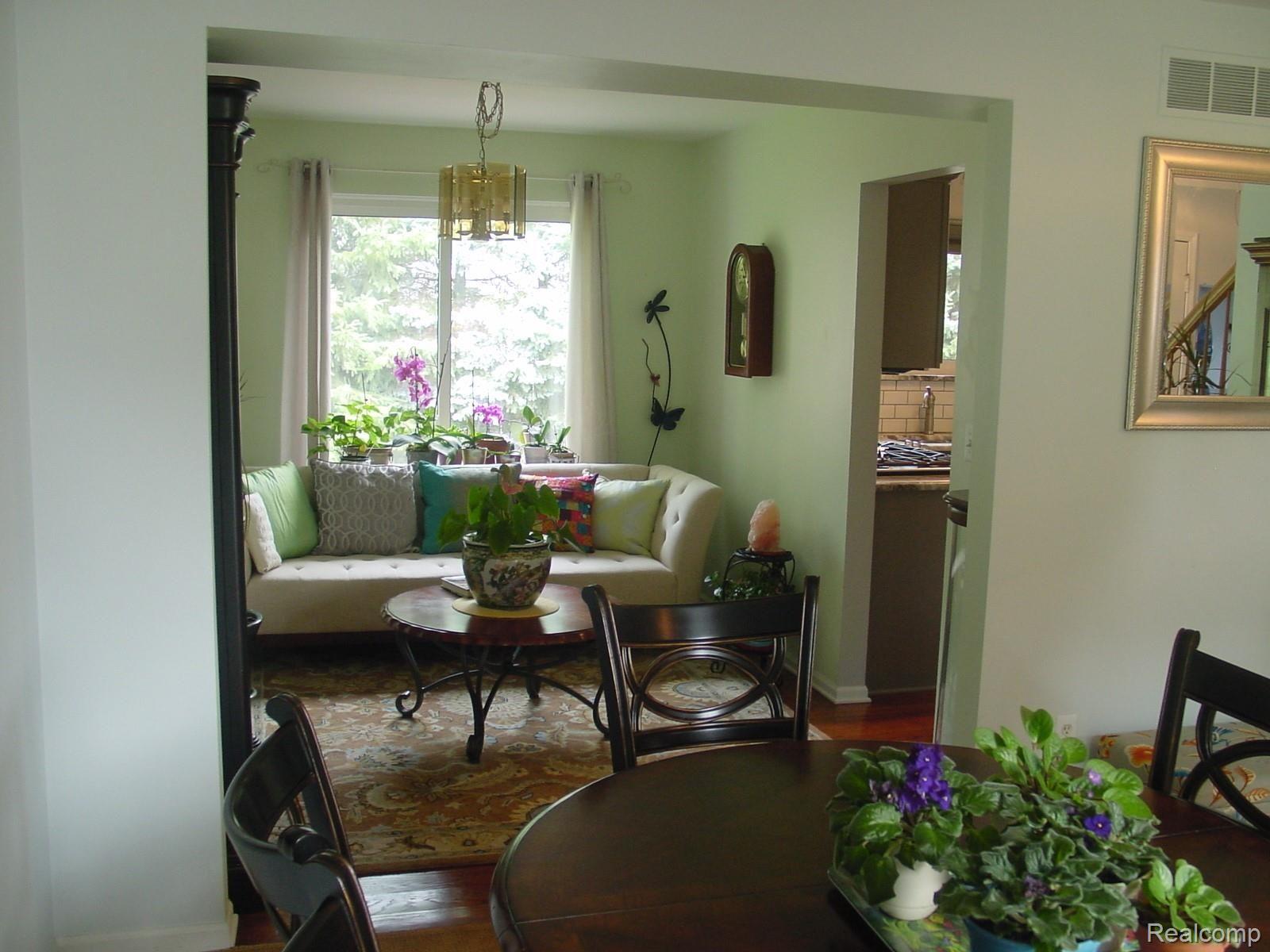 130 Chestnut Ridge Walled Lake, MI 48390 - Photo 3 of 32 dining into sitting area.JPG