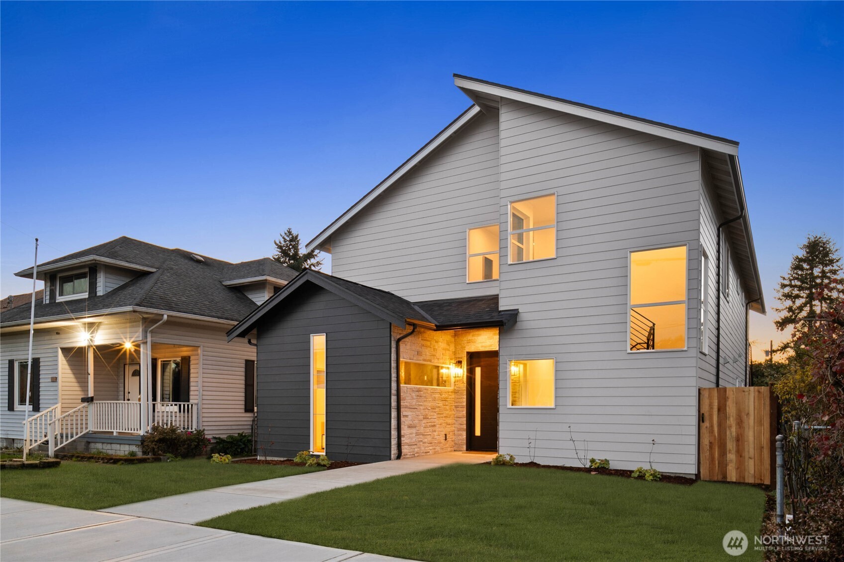 511 Morris Avenue South Renton, WA 98057 - Photo 2 of 40 a front view of a house with a yard