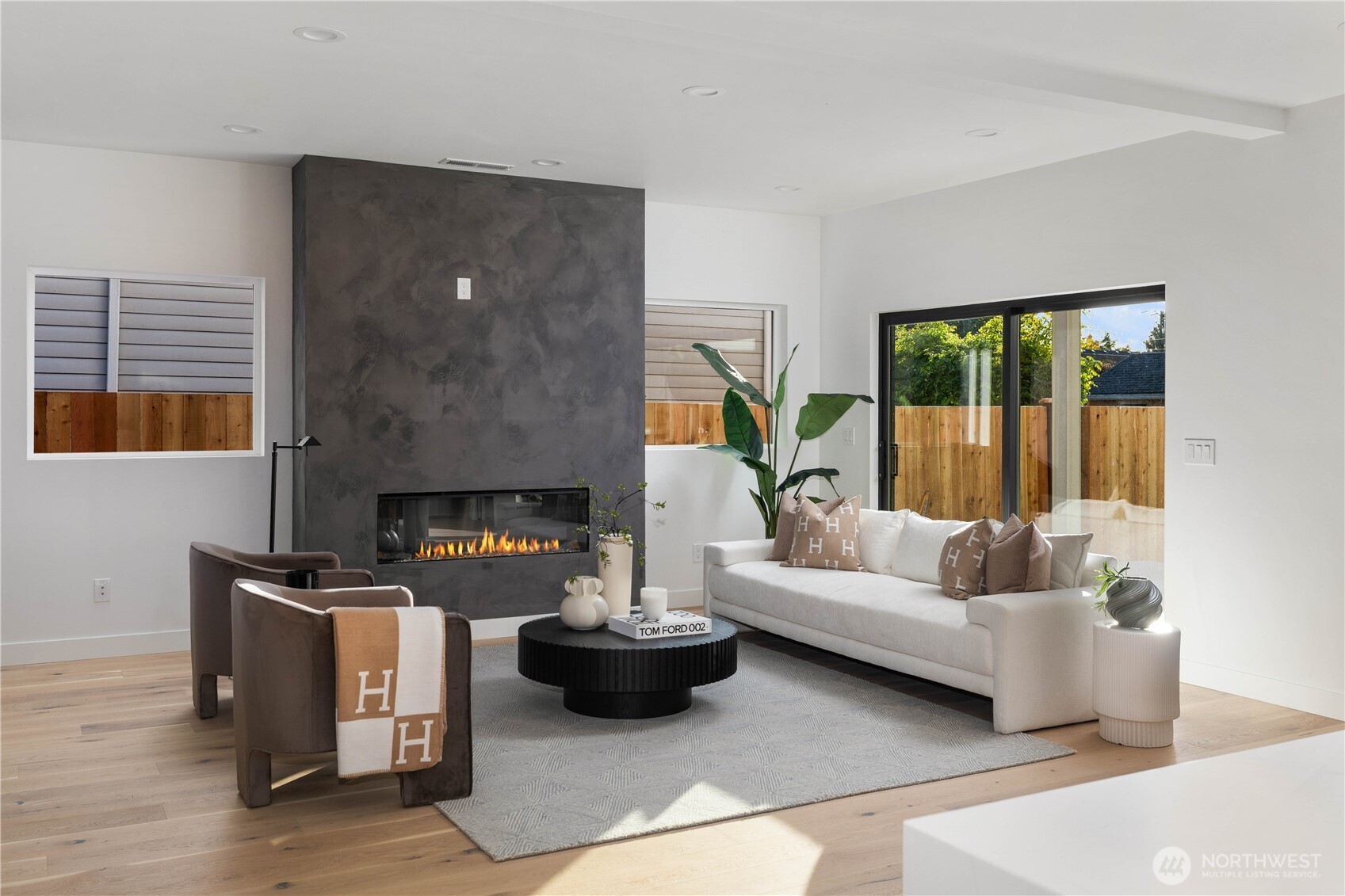 511 Morris Avenue South Renton, WA 98057 - Photo 21 of 40 a living room with furniture and a fireplace