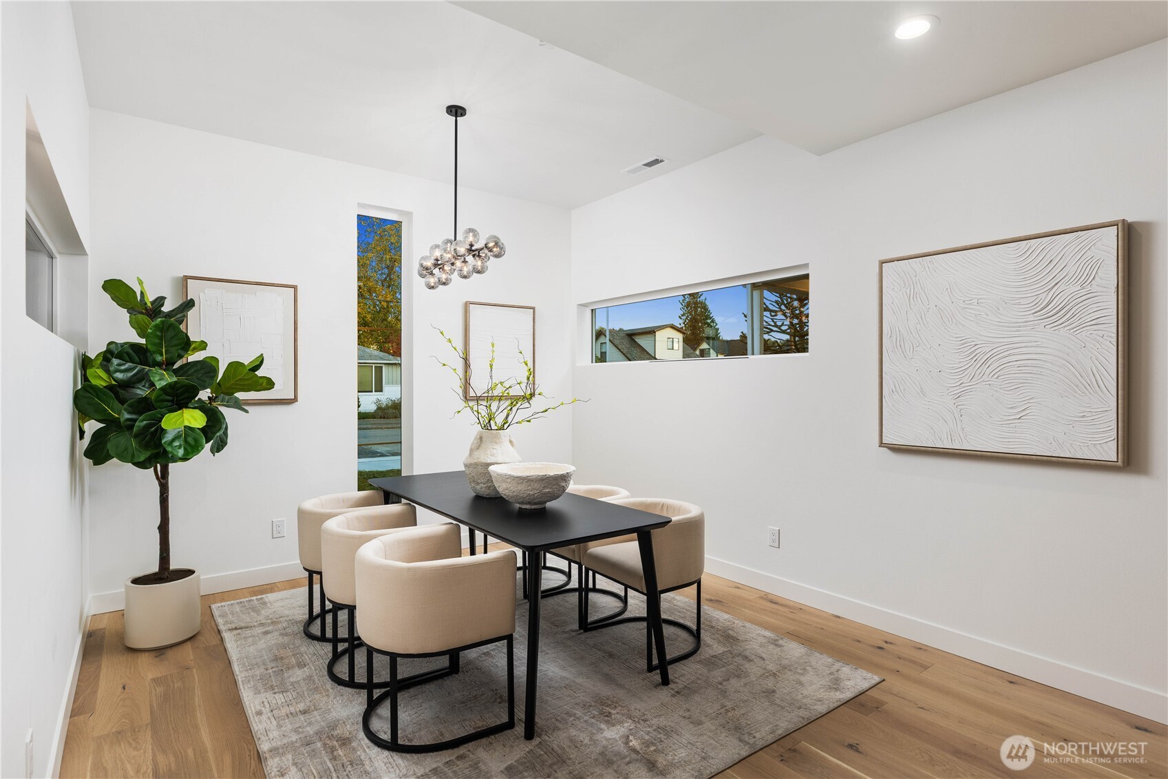 511 Morris Avenue South Renton, WA 98057 - Photo 22 of 40 a living room with furniture and a potted plant
