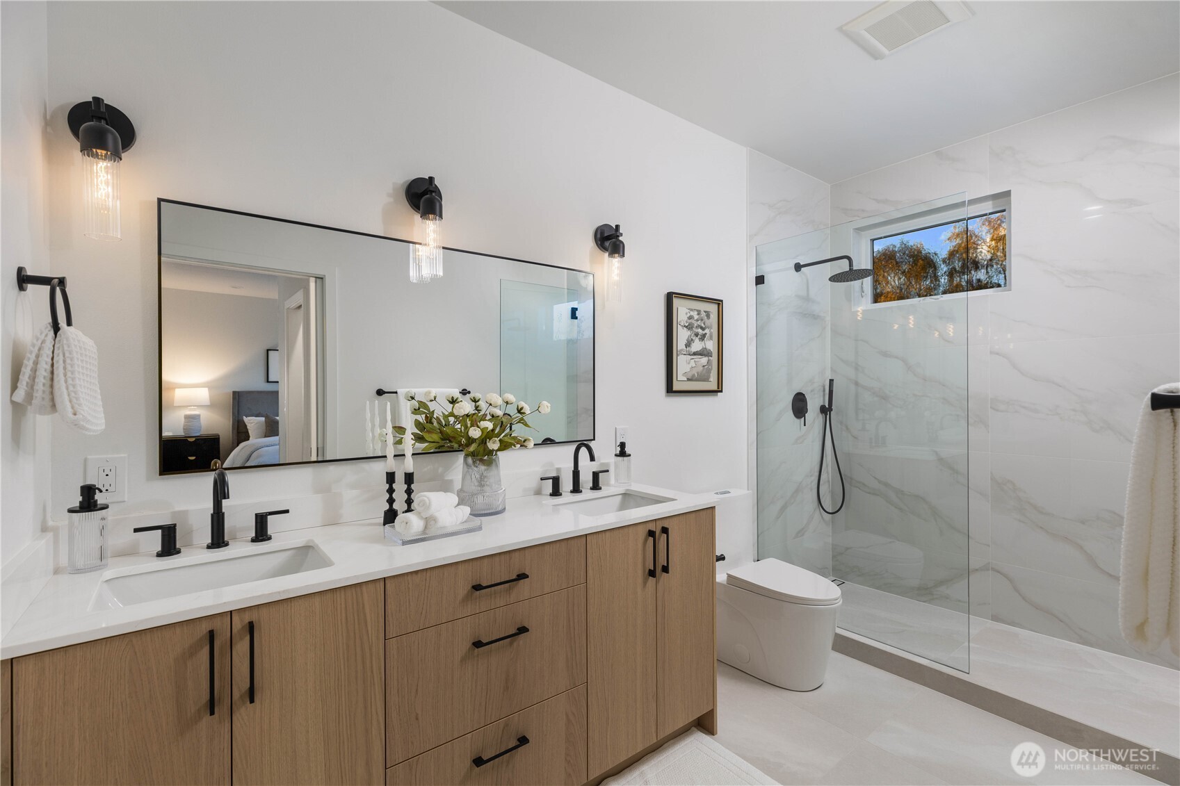 511 Morris Avenue South Renton, WA 98057 - Photo 27 of 40 a bathroom with a double vanity sink toilet and shower
