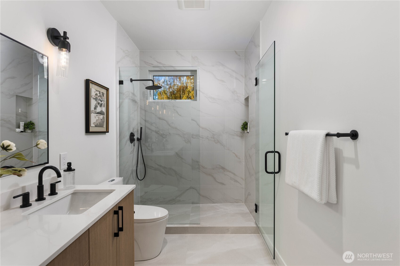 511 Morris Avenue South Renton, WA 98057 - Photo 28 of 40 a bathroom with a sink toilet and shower