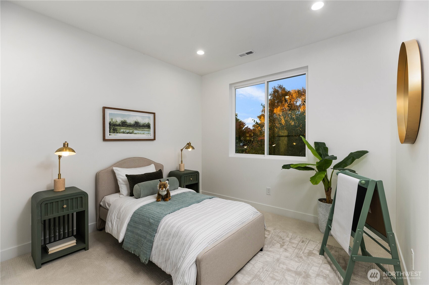 511 Morris Avenue South Renton, WA 98057 - Photo 32 of 40 a bedroom with a bed and a window
