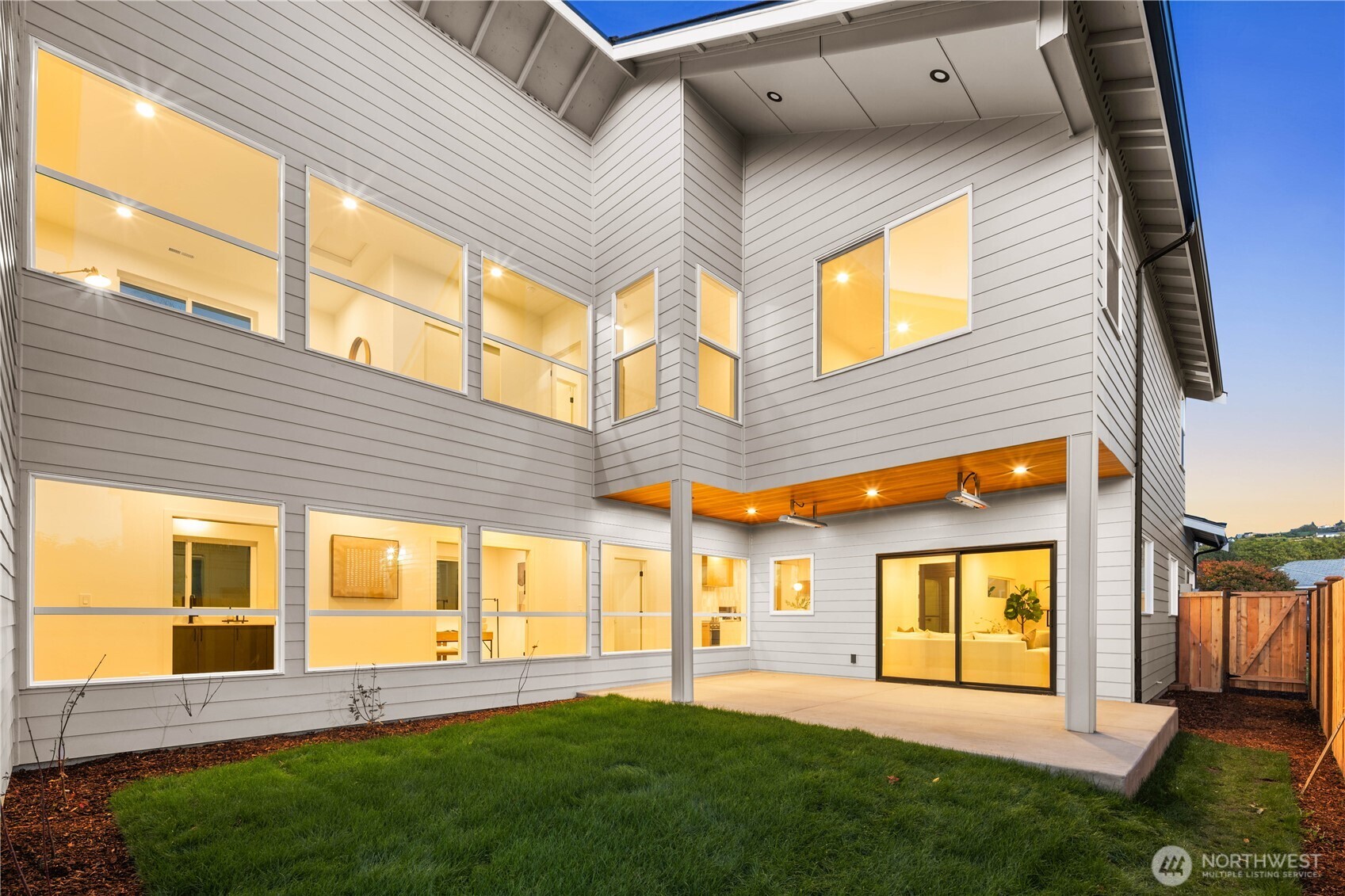 511 Morris Avenue South Renton, WA 98057 - Photo 5 of 40 a front view of a house with a yard and garage