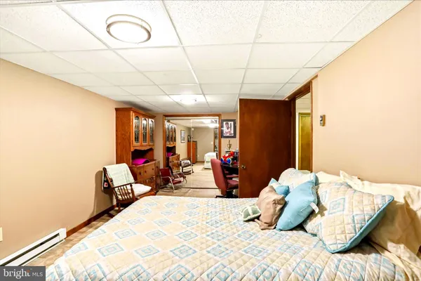a kitchen with stainless steel appliances granite countertop a stove top oven a refrigerator and a sink