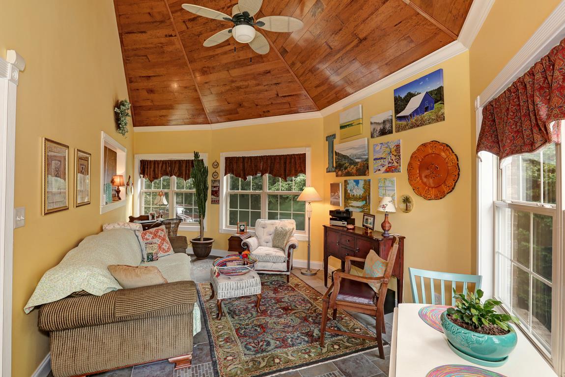 1690 Alf Harris Road Prospect, TN 38477 - Photo 12 of 30 a living room with furniture and a floor to ceiling window