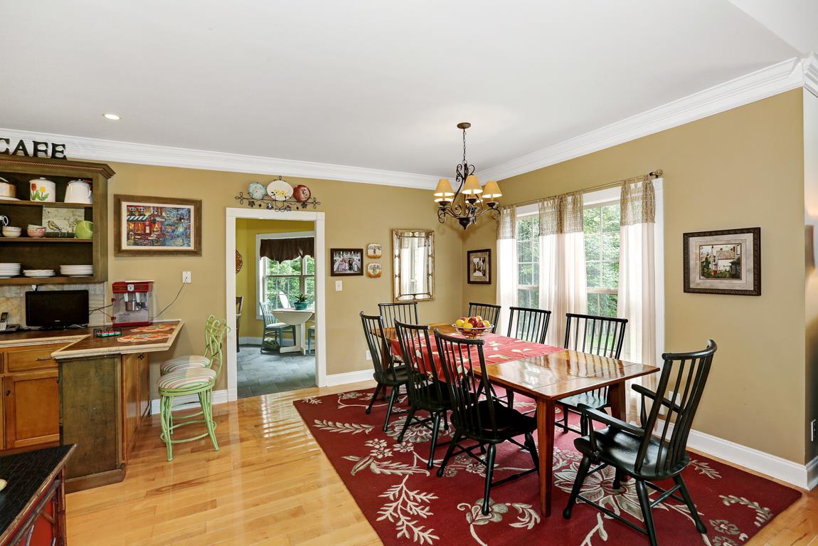 1690 Alf Harris Road Prospect, TN 38477 - Photo 17 of 30 a view of a dining room with furniture and chandelier