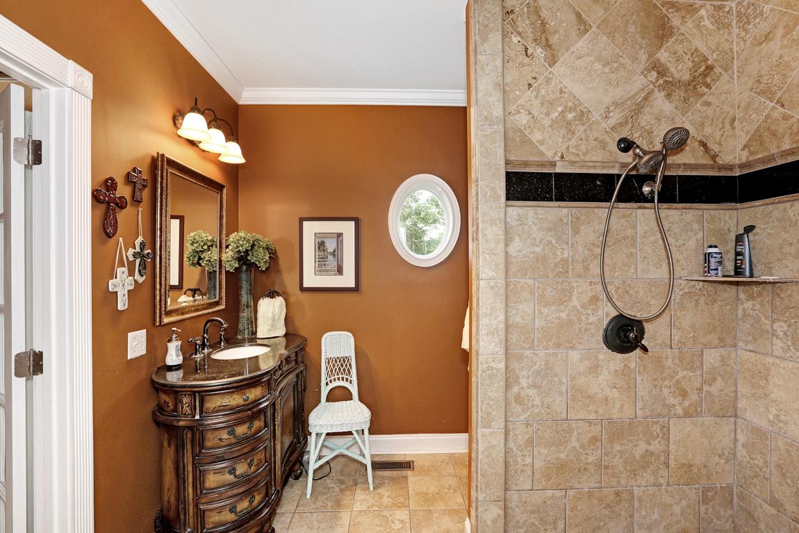 1690 Alf Harris Road Prospect, TN 38477 - Photo 20 of 30 a bathroom with a toilet and a shower