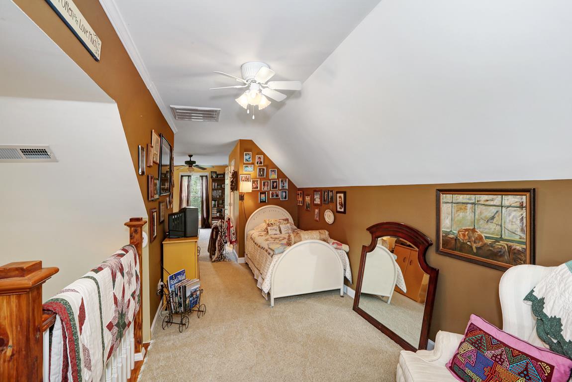 1690 Alf Harris Road Prospect, TN 38477 - Photo 26 of 30 a living room with furniture a fireplace and a large window