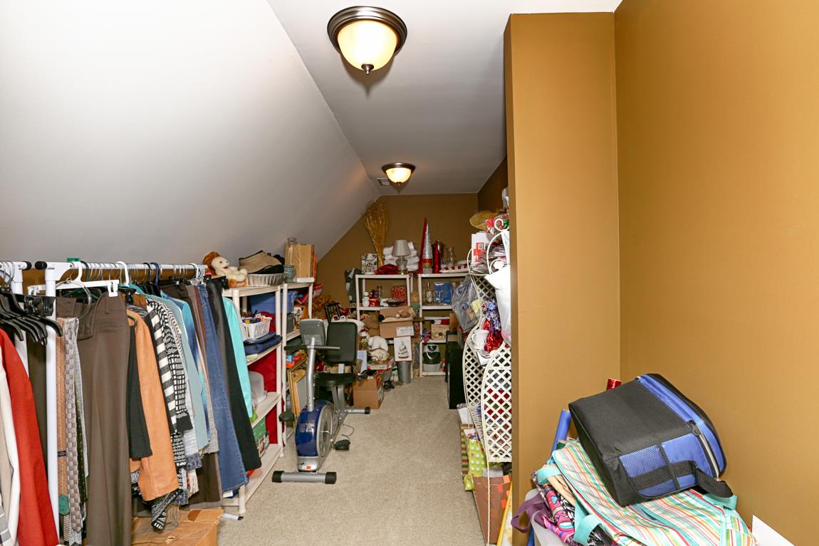 1690 Alf Harris Road Prospect, TN 38477 - Photo 29 of 30 a view of walk in closet with clothes