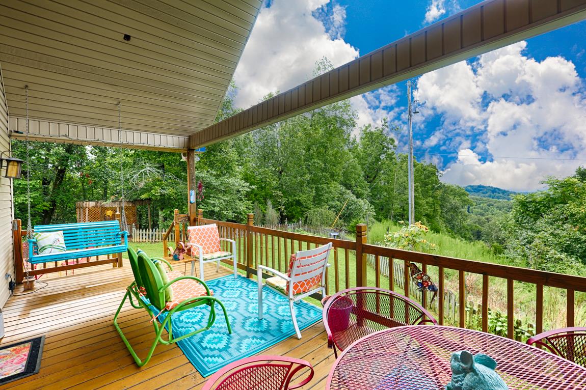 1690 Alf Harris Road Prospect, TN 38477 - Photo 5 of 30 a view of a two chairs in the balcony