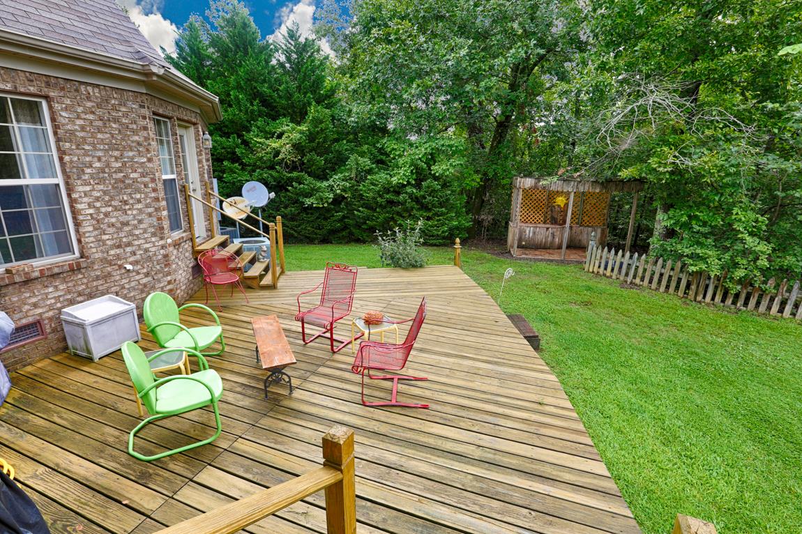 1690 Alf Harris Road Prospect, TN 38477 - Photo 6 of 30 a view of backyard from deck having patio