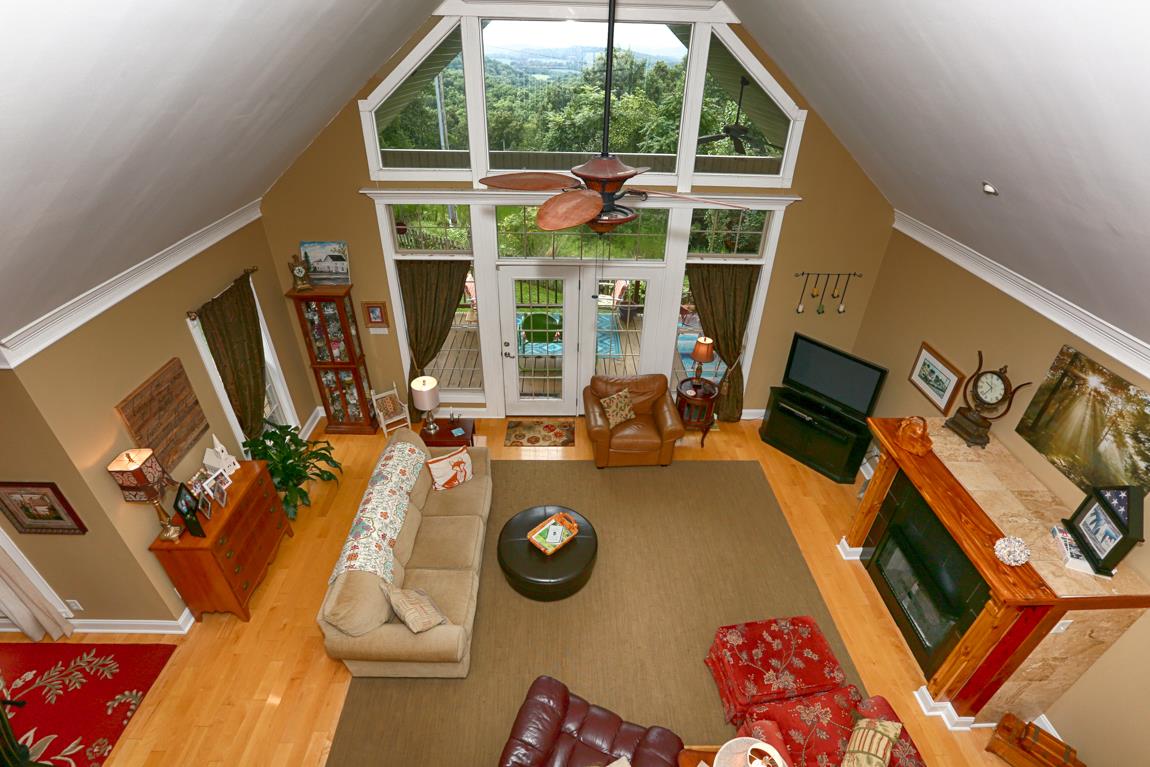 1690 Alf Harris Road Prospect, TN 38477 - Photo 8 of 30 a view of living room with furniture and a flat screen tv
