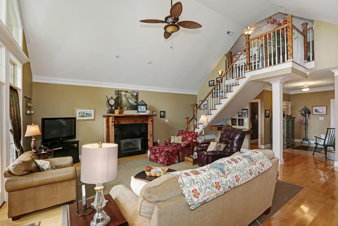 1690 Alf Harris Road Prospect, TN 38477 - Photo 10 of 30 a living room with furniture a fireplace and a flat screen tv