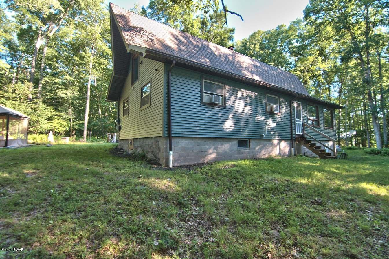 365 Welcome Lake Road Beach Lake, PA 18405 - Photo 45 of 45 a view of a house with a yard