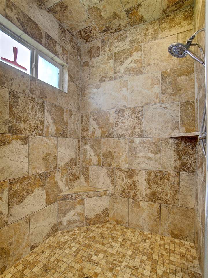 1171 Toscano Road Fruita, CO 81521 - Photo 15 of 27 a bathroom with a shower