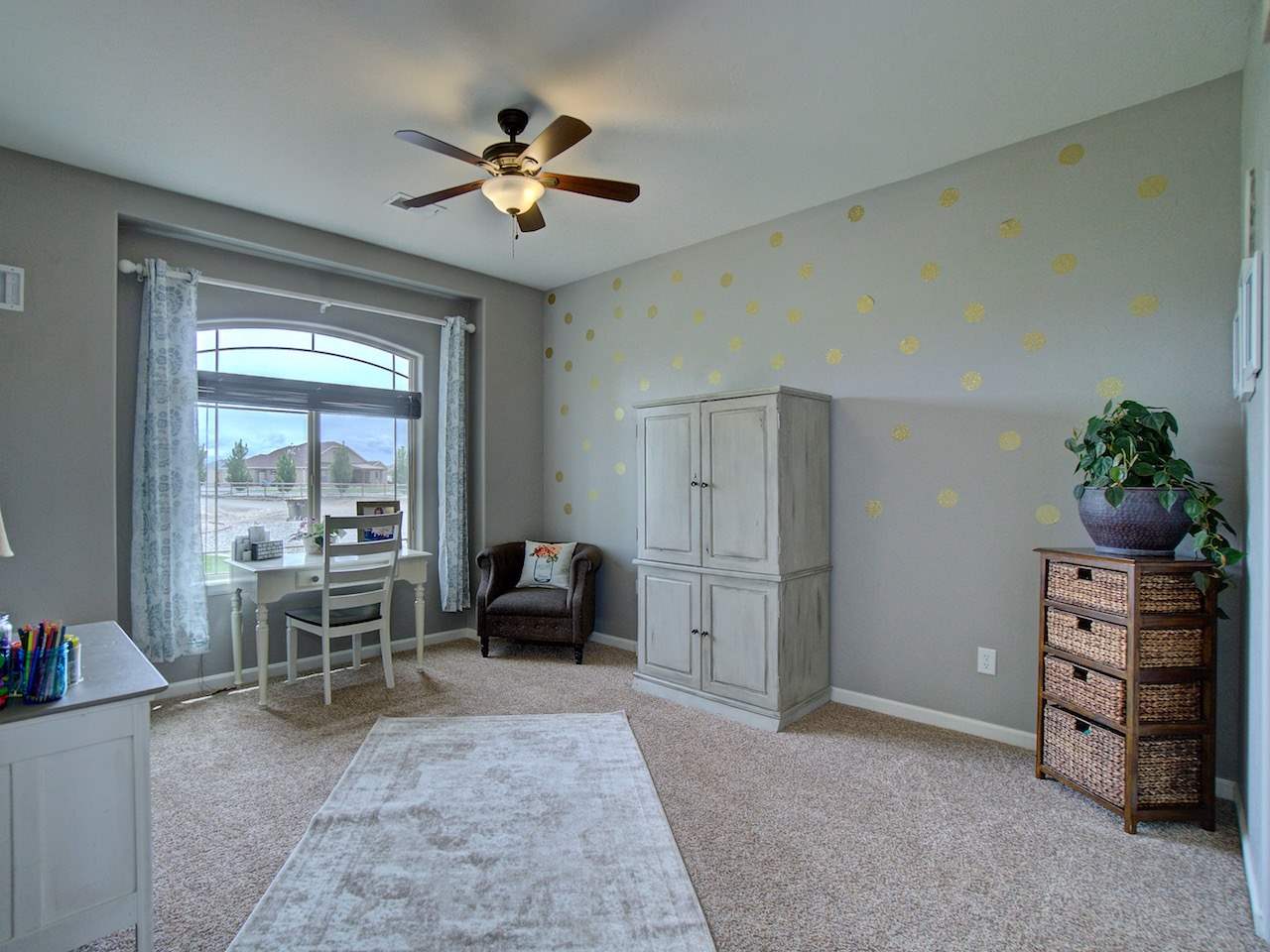 1171 Toscano Road Fruita, CO 81521 - Photo 19 of 27 a living room with furniture and a window
