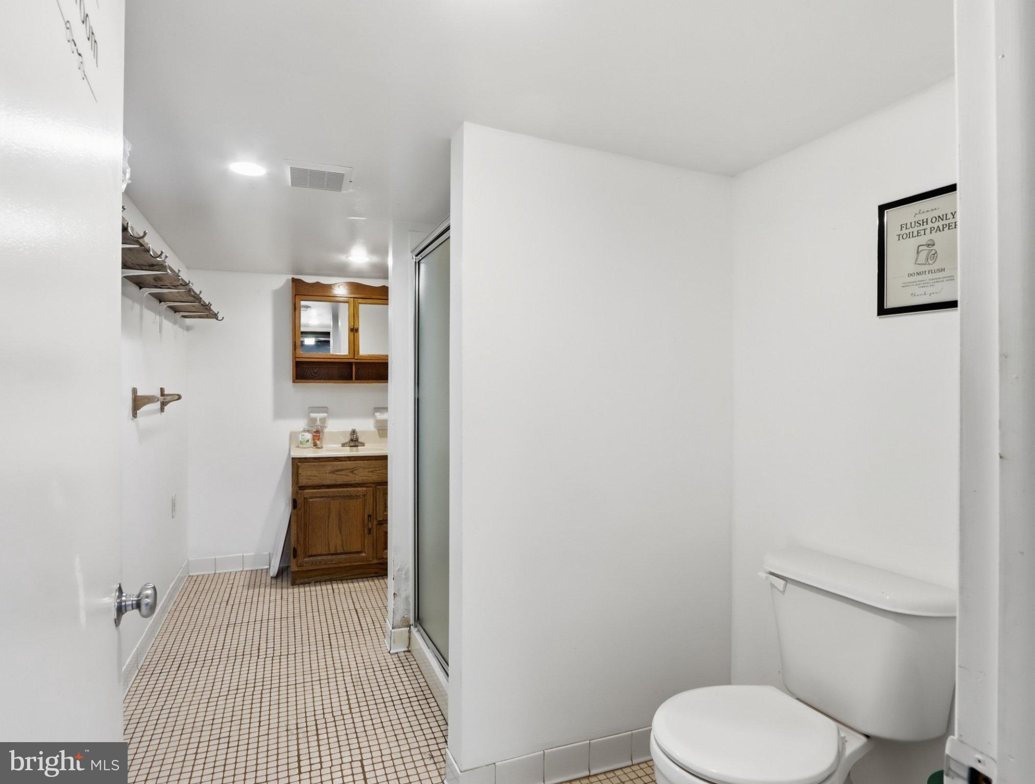 285 Cove Road Pasadena, MD 21122 - Photo 46 of 52 full bathroom on the lower level