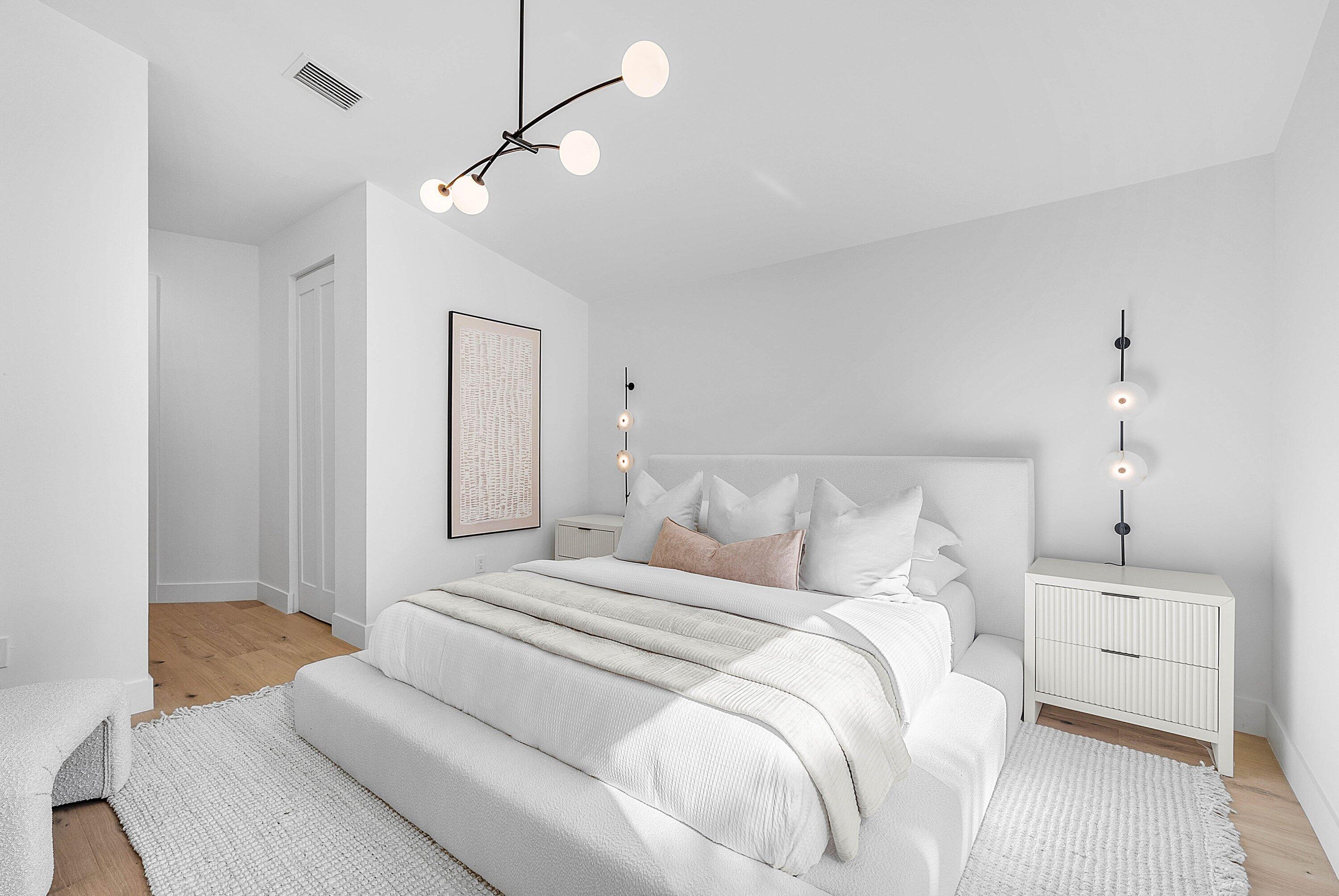 5723 Aspen Ridge Circle Delray Beach, FL 33484 - Photo 22 of 47 a large white bed in a white room